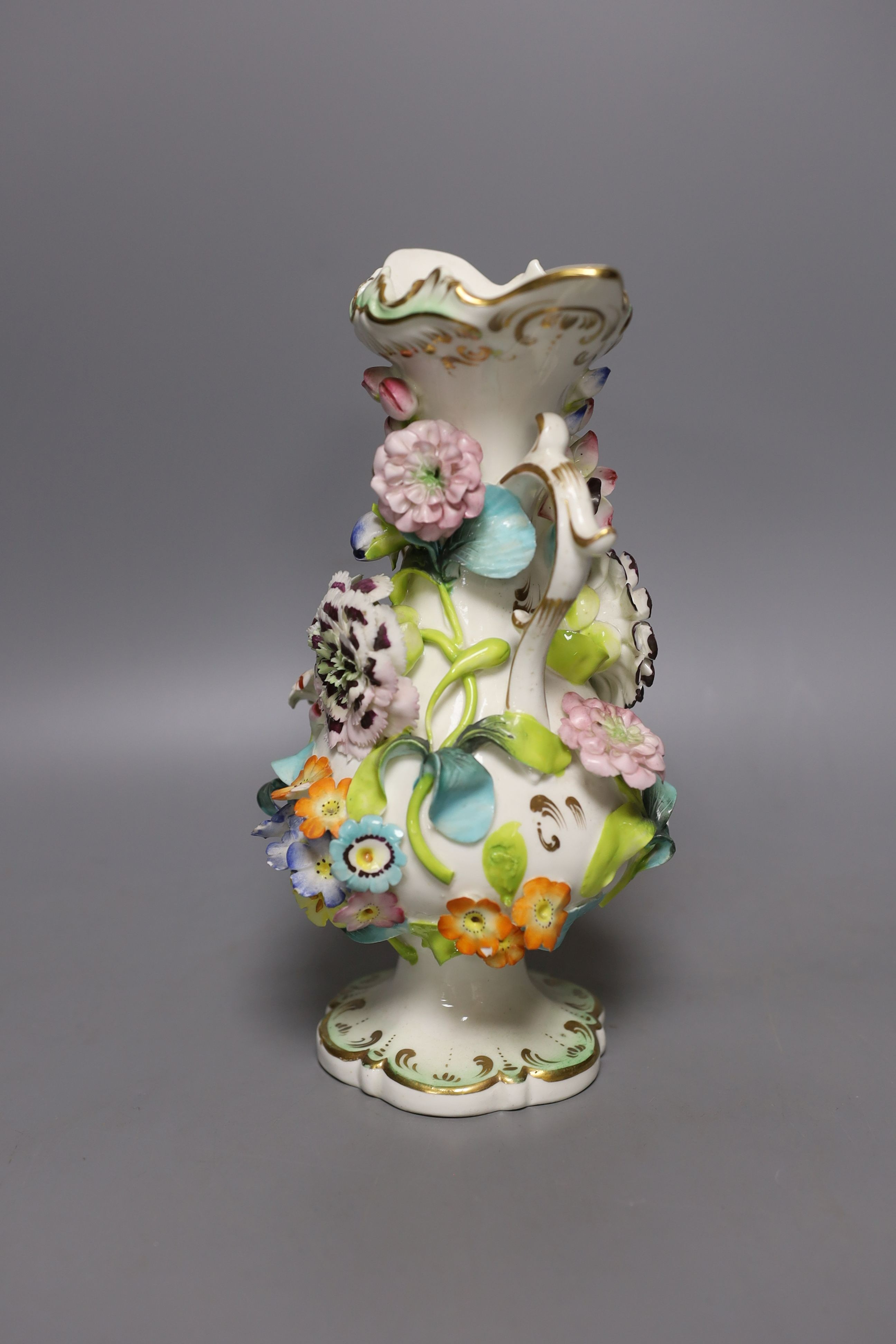 An English porcelain flower encrusted vase in Rockingham style c.1830 - 23cm high